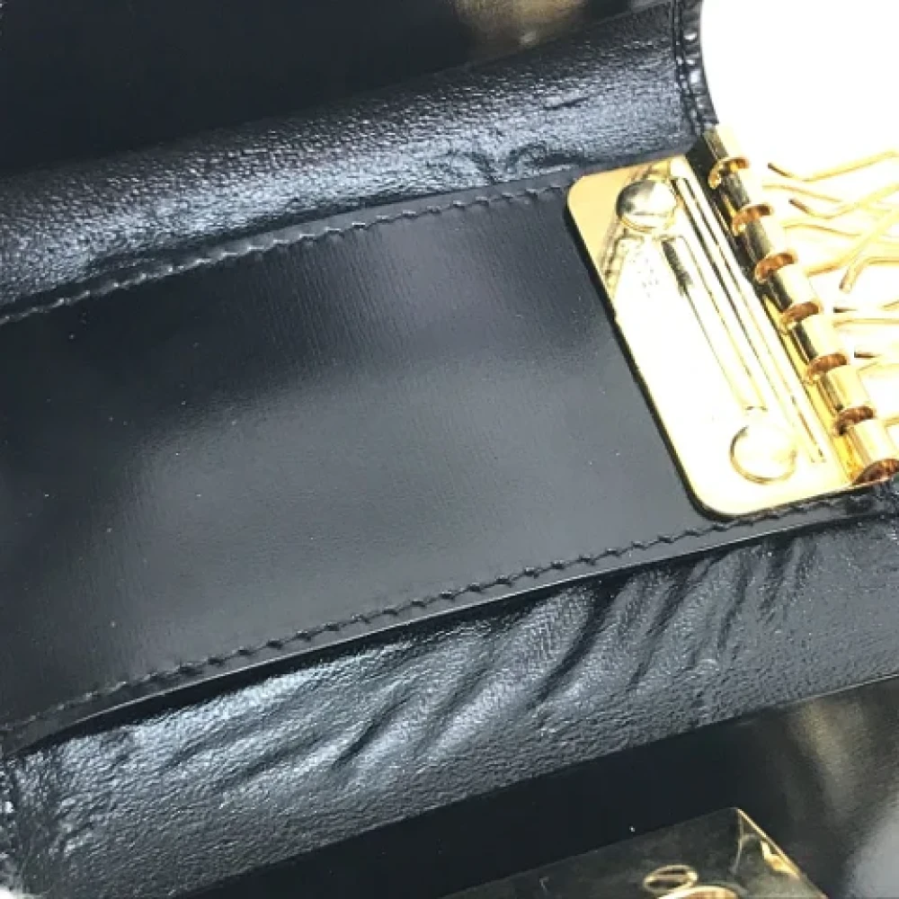 Salvatore Ferragamo Pre-owned Leather key-holders Black Dames