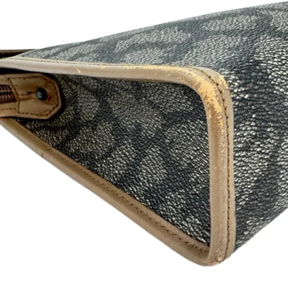 Yves Saint Laurent Vintage Pre-owned Leather clutches Gray Dames