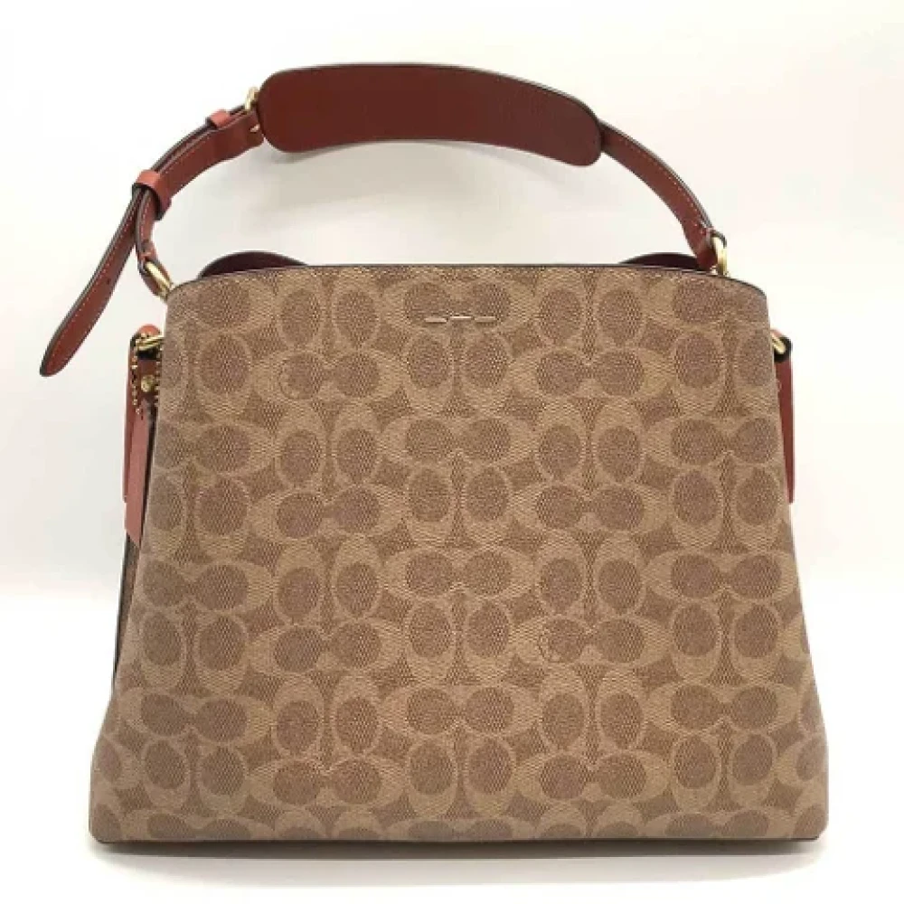 Coach Pre-owned Plastic shoulder-bags Brown Dames