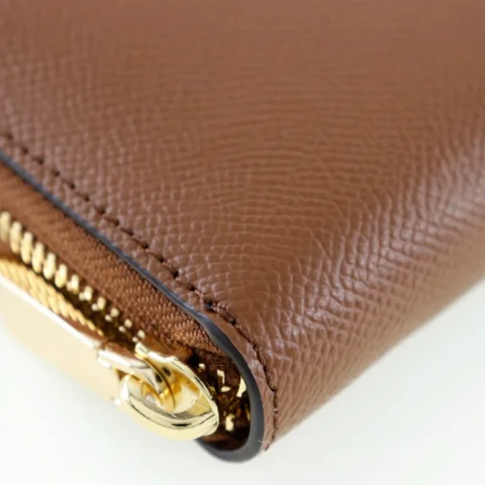Michael Kors Pre-owned Leather wallets Brown Dames