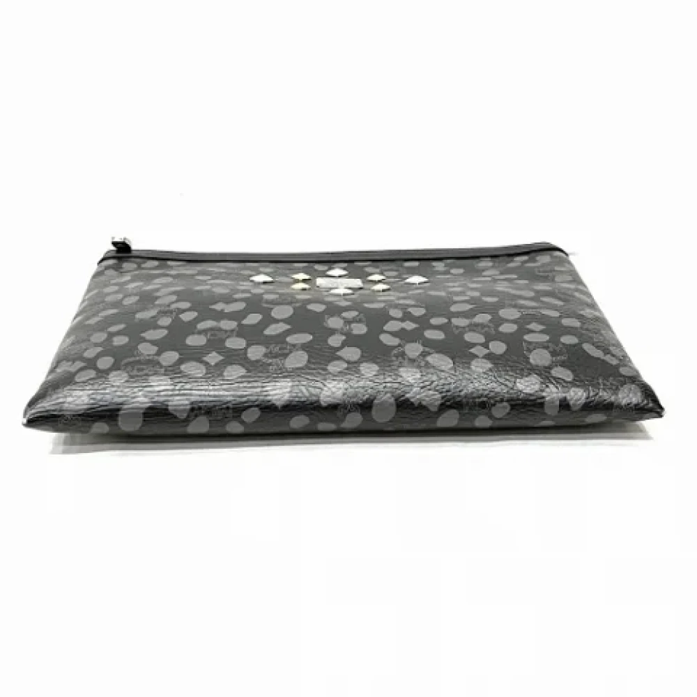 MCM Pre-owned Leather clutches Black Dames