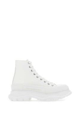 white-canvas-and-rubber-tread-slick-sneakers