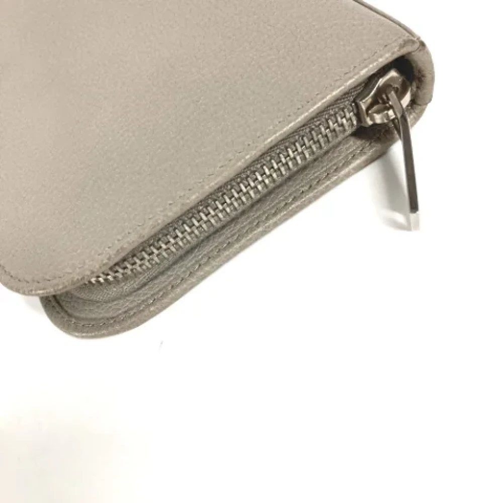Yves Saint Laurent Vintage Pre-owned Leather wallets Gray Dames