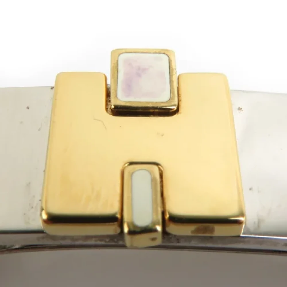 Hermès Vintage Pre-owned Metal hair-accessories Yellow Dames