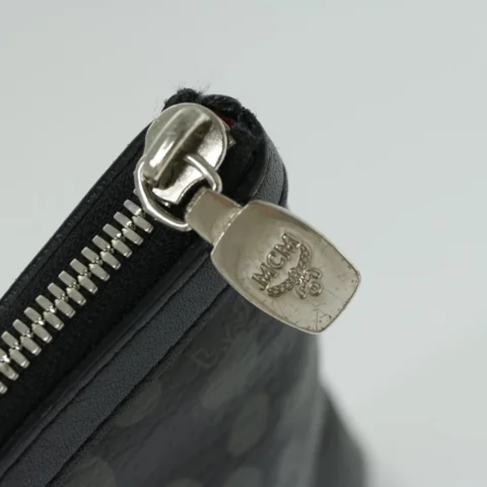 MCM Pre-owned Leather clutches Black Dames