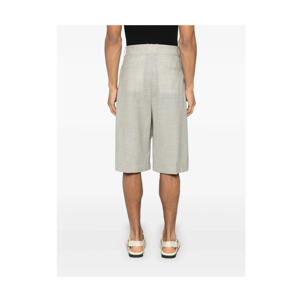 Studio Nicholson Beige Broek met Zakken en Knopen Gray Heren
