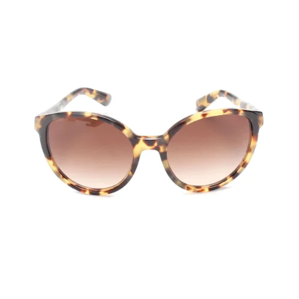 Miu Pre-owned Plastic sunglasses Brown Dames