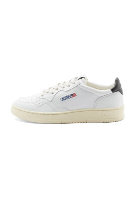 sneaker-vintage-en-cuir-blanc-and-noir