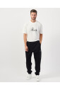 zwarte-broek-met-zijzak-met-rits