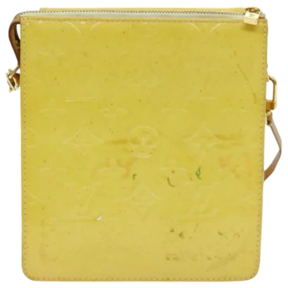 Louis Vuitton Vintage Pre-owned Leather clutches Yellow Dames