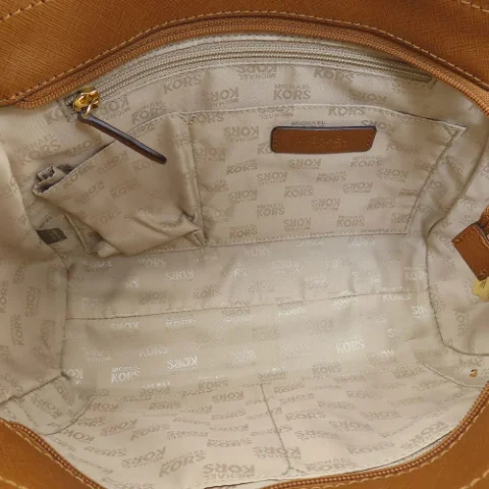 Michael Kors Pre-owned Canvas shoulder-bags Brown Dames