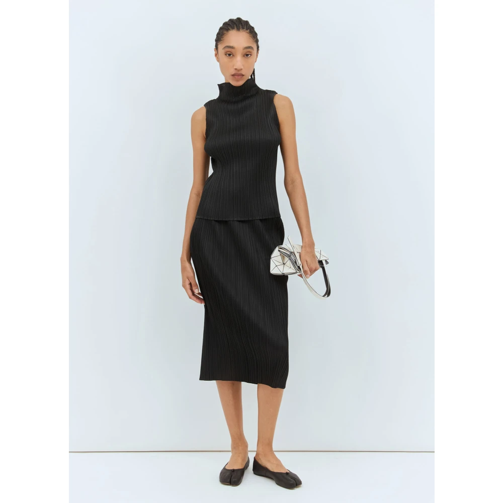 Issey Miyake Geplooide hoge hals top Black Dames