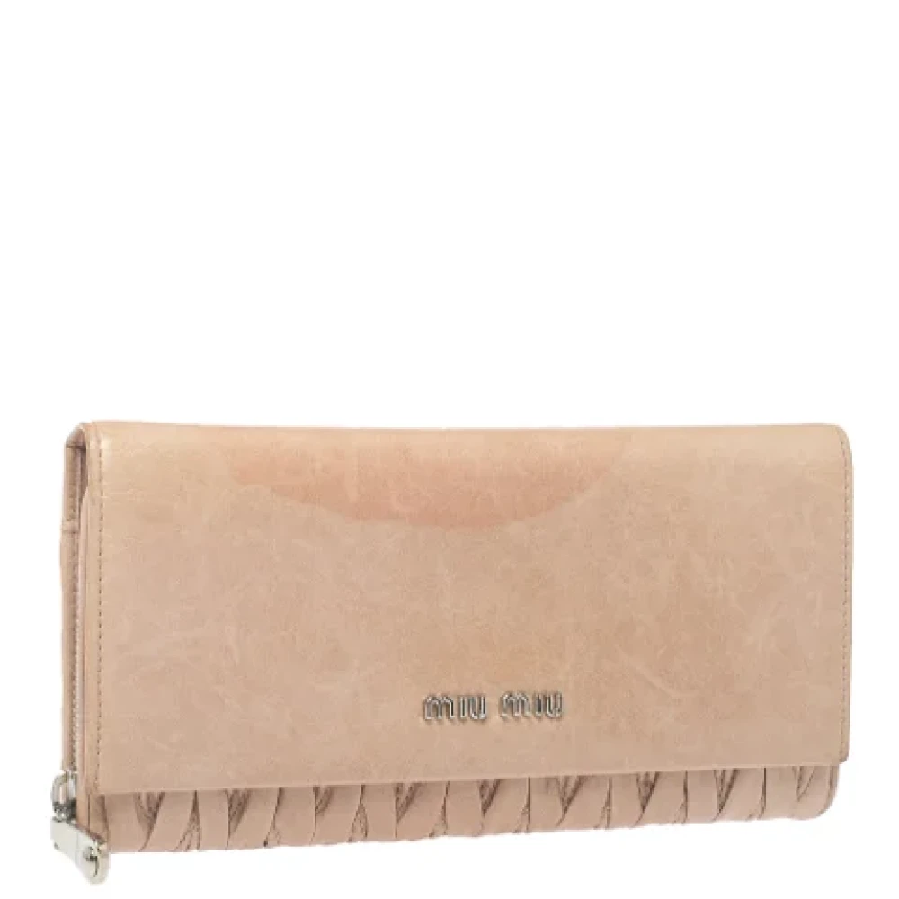 Miu Pre-owned Leather wallets Beige Dames