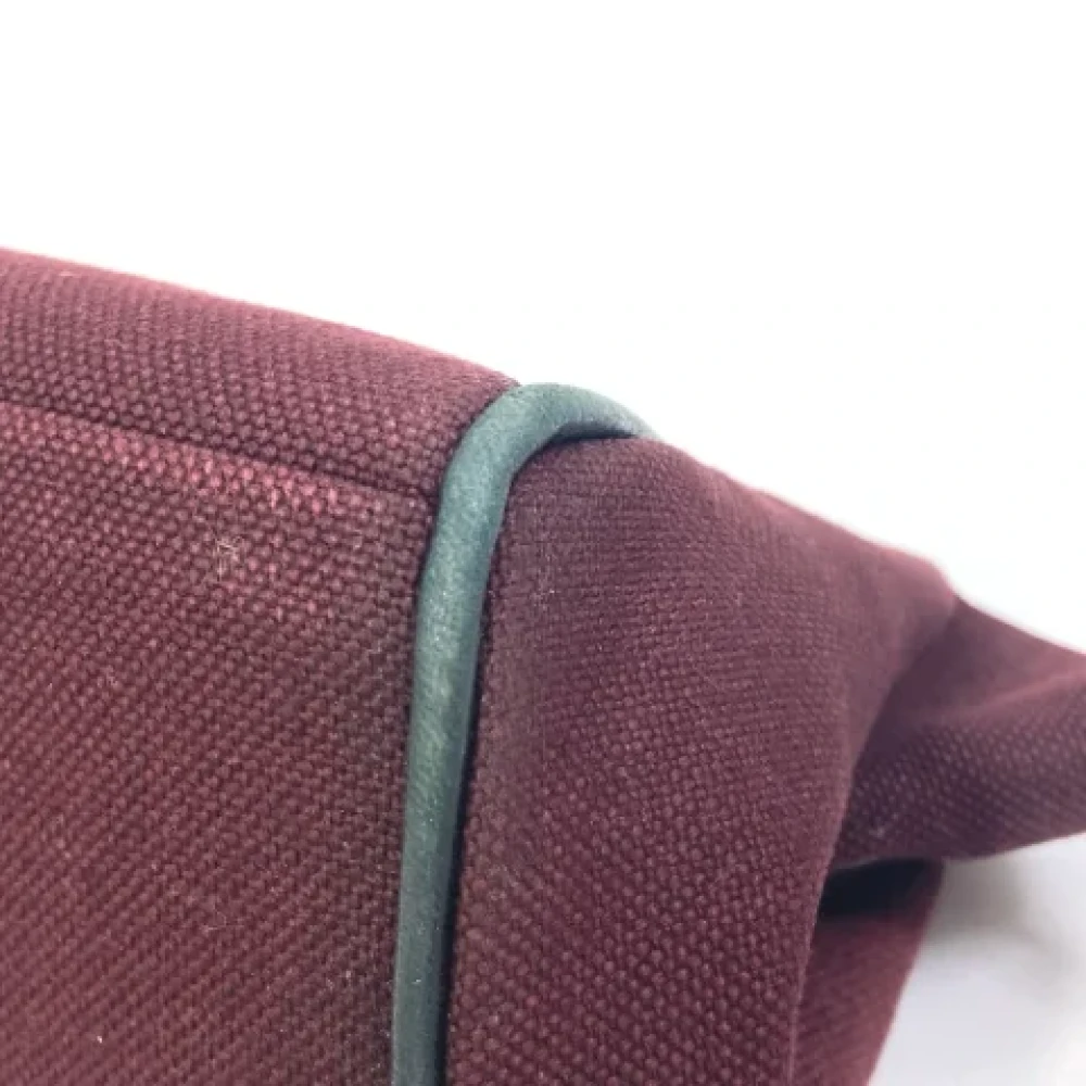 Hermès Vintage Pre-owned Fabric clutches Red Dames