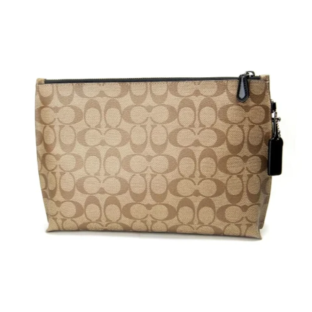 Coach Pre-owned Canvas clutches Brown Dames