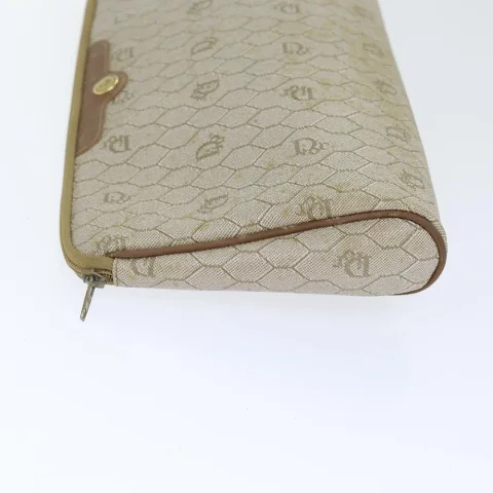 Dior Vintage Pre-owned Leather clutches Beige Dames