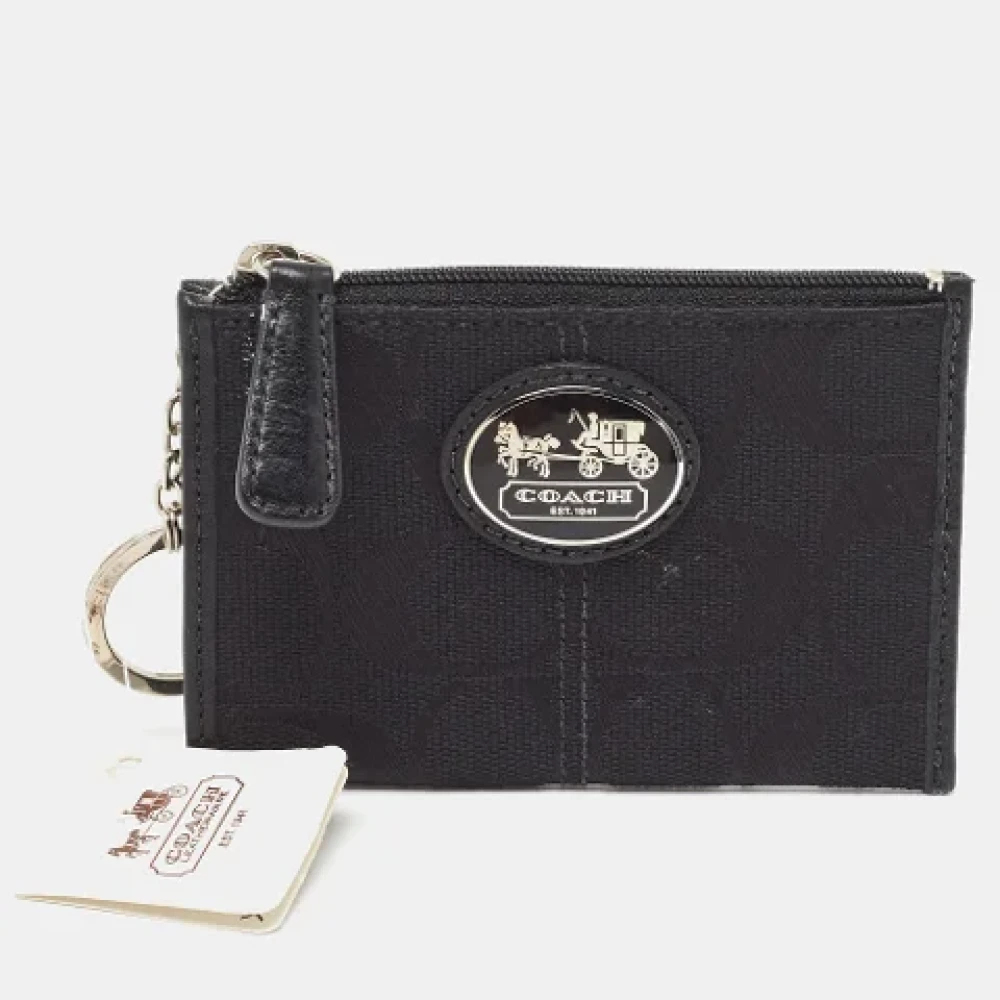 Coach Pre-owned Canvas wallets Black Dames