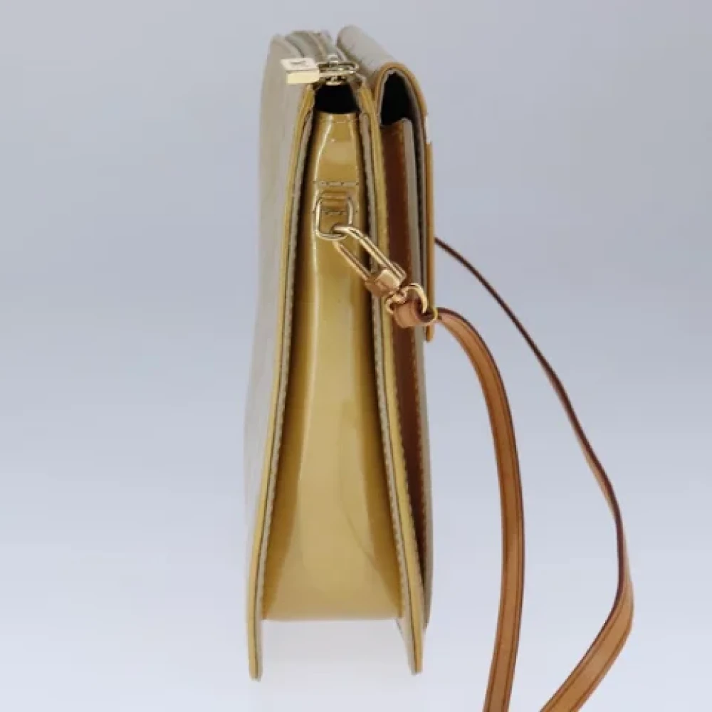 Louis Vuitton Vintage Pre-owned Leather clutches Beige Dames