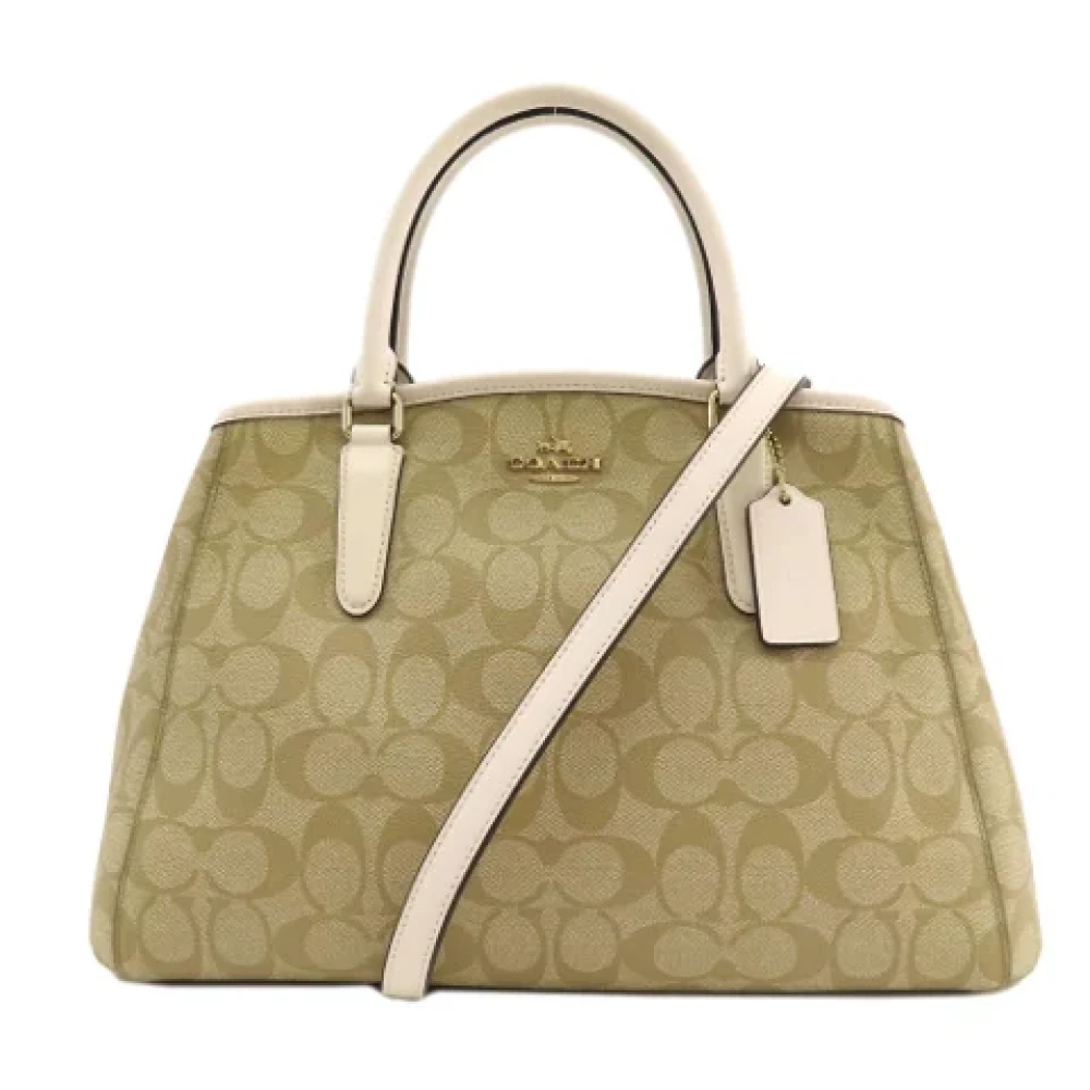 Coach Pre-owned Plastic handbags Beige Dames
