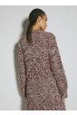 pull-a-boucles-avec-fils-laches