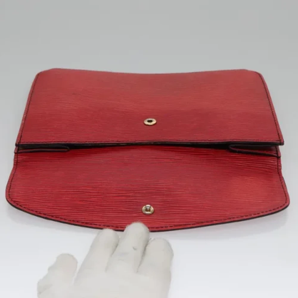 Louis Vuitton Vintage Pre-owned Leather clutches Red Dames
