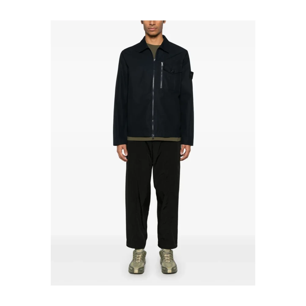 Stone Island Blauwe jassen met tweewegritssluiting Blue Heren