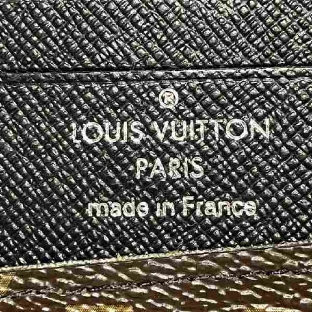 Louis Vuitton Vintage Pre-owned Canvas wallets Brown Heren