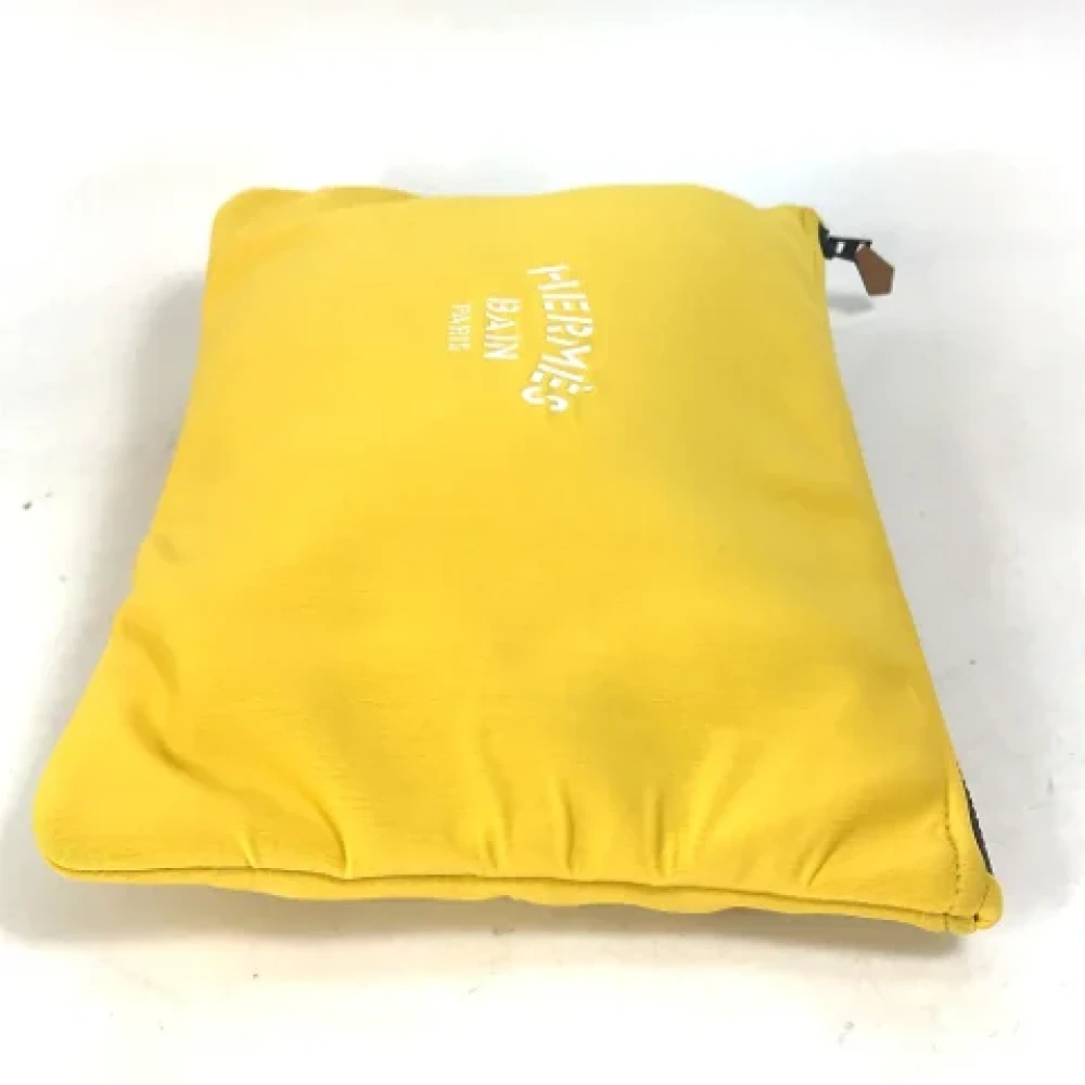 Hermès Vintage Pre-owned Fabric clutches Yellow Dames