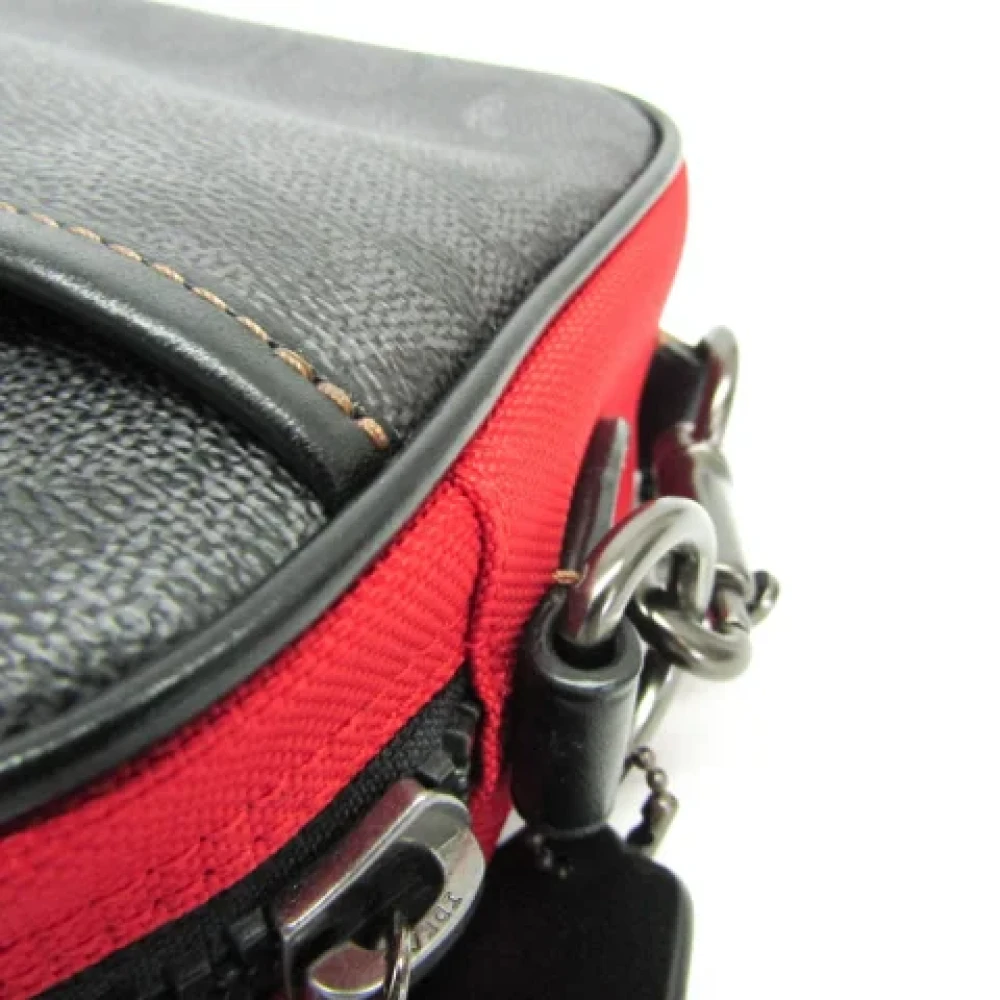 Coach Pre-owned Canvas shoulder-bags Black Unisex