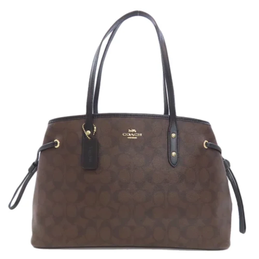 Coach Pre-owned Plastic handbags Brown Dames