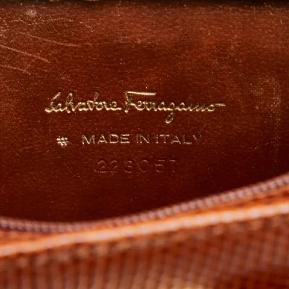 Salvatore Ferragamo Pre-owned Leather clutches Brown Dames