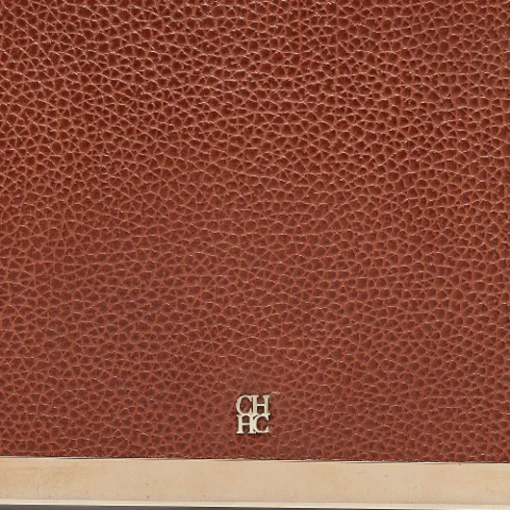 Carolina Herrera Pre-owned Leather clutches Brown Dames