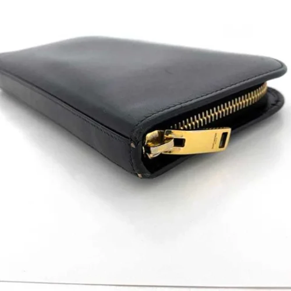 Yves Saint Laurent Vintage Pre-owned Leather wallets Black Dames