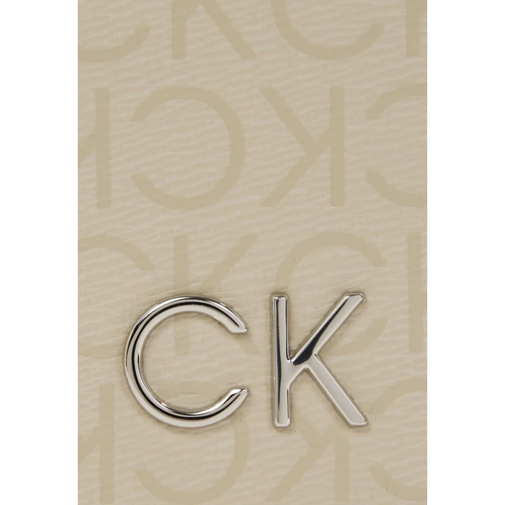 Calvin Klein Epi Mono Daily Saddle Bag Beige Dames