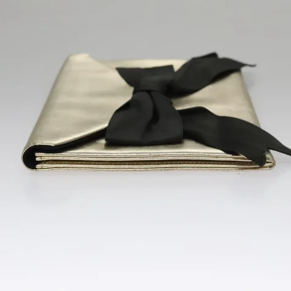 Saint Laurent Vintage Pre-owned Leather clutches Yellow Dames
