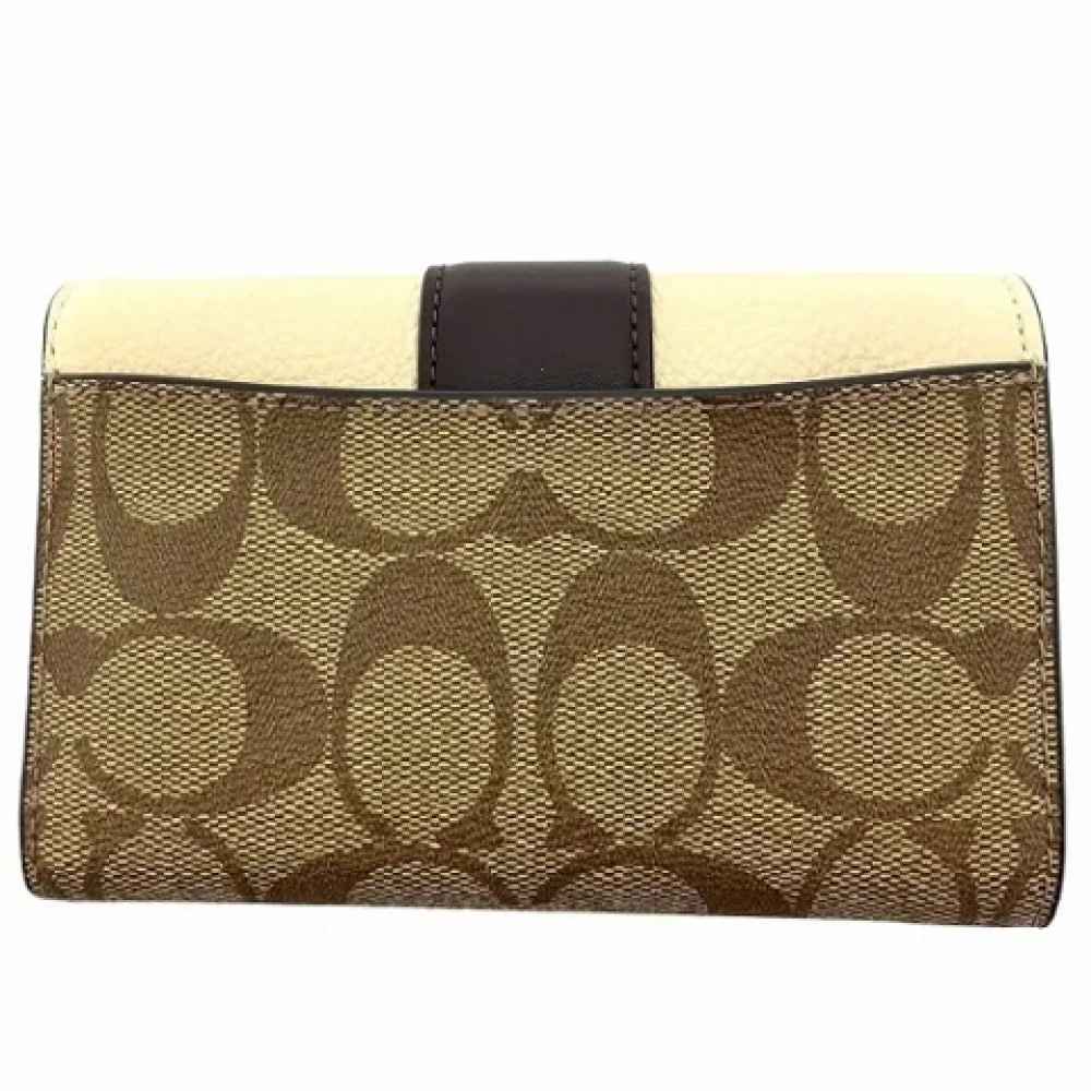 Coach Pre-owned Leather wallets Brown Dames