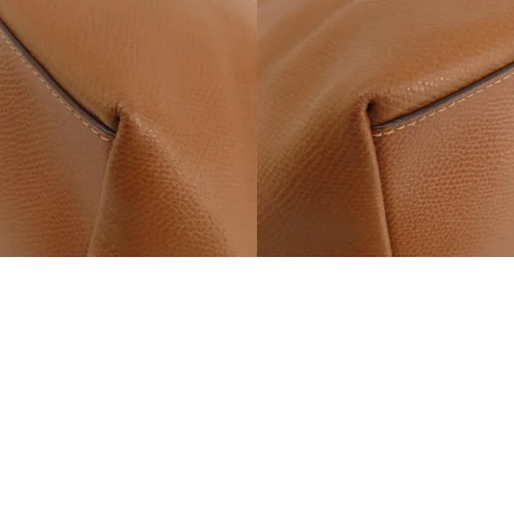 Coach Pre-owned Plastic shoulder-bags Brown Dames
