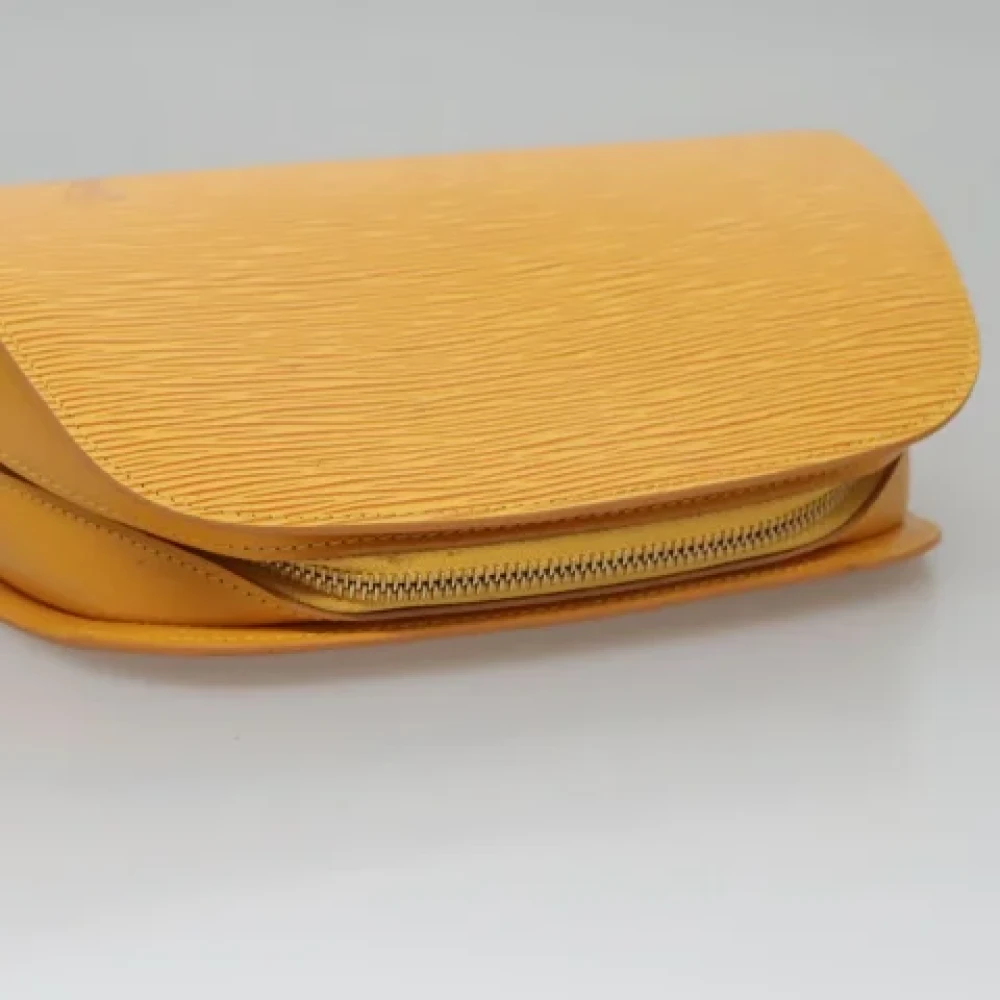 Louis Vuitton Vintage Pre-owned Leather pouches Yellow Dames