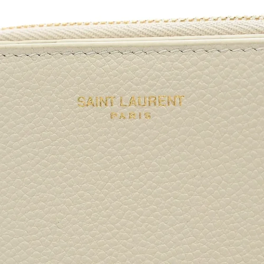 Saint Laurent Vintage Tweedehands Naakt lederen Saint Laurent portemonnee Beige Dames
