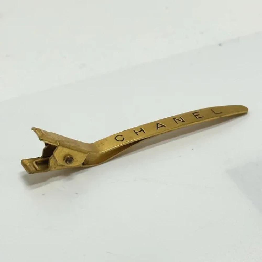 Chanel Vintage Pre-owned Metal hair-accessories Yellow Dames