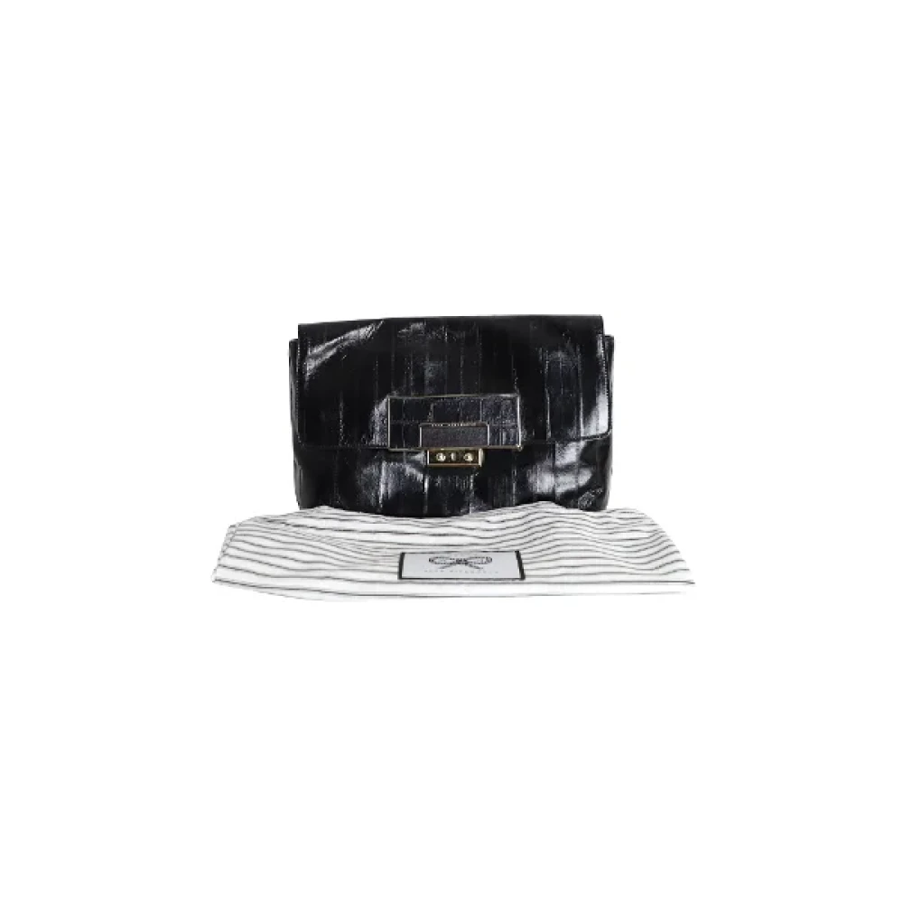 Anya Hindmarch Pre-owned Leather clutches Black Dames