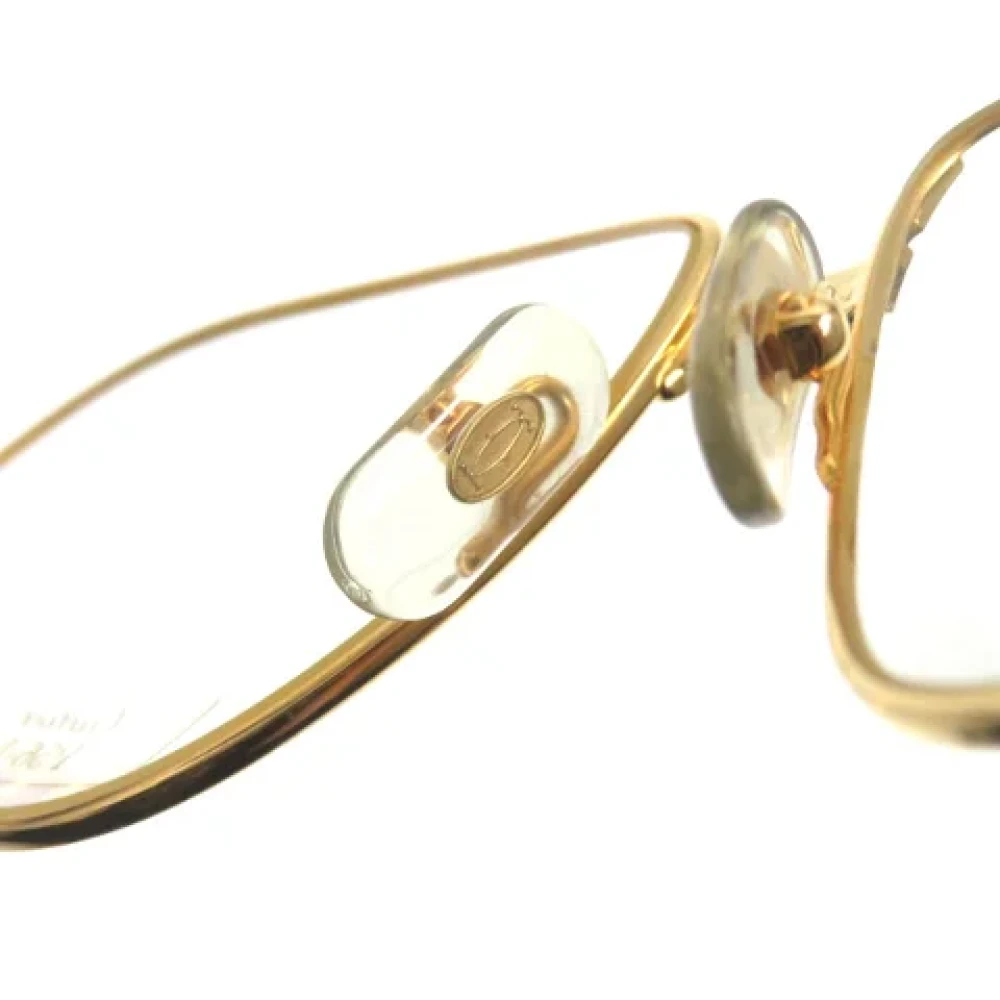 Cartier Vintage Pre-owned Metal sunglasses Yellow Dames