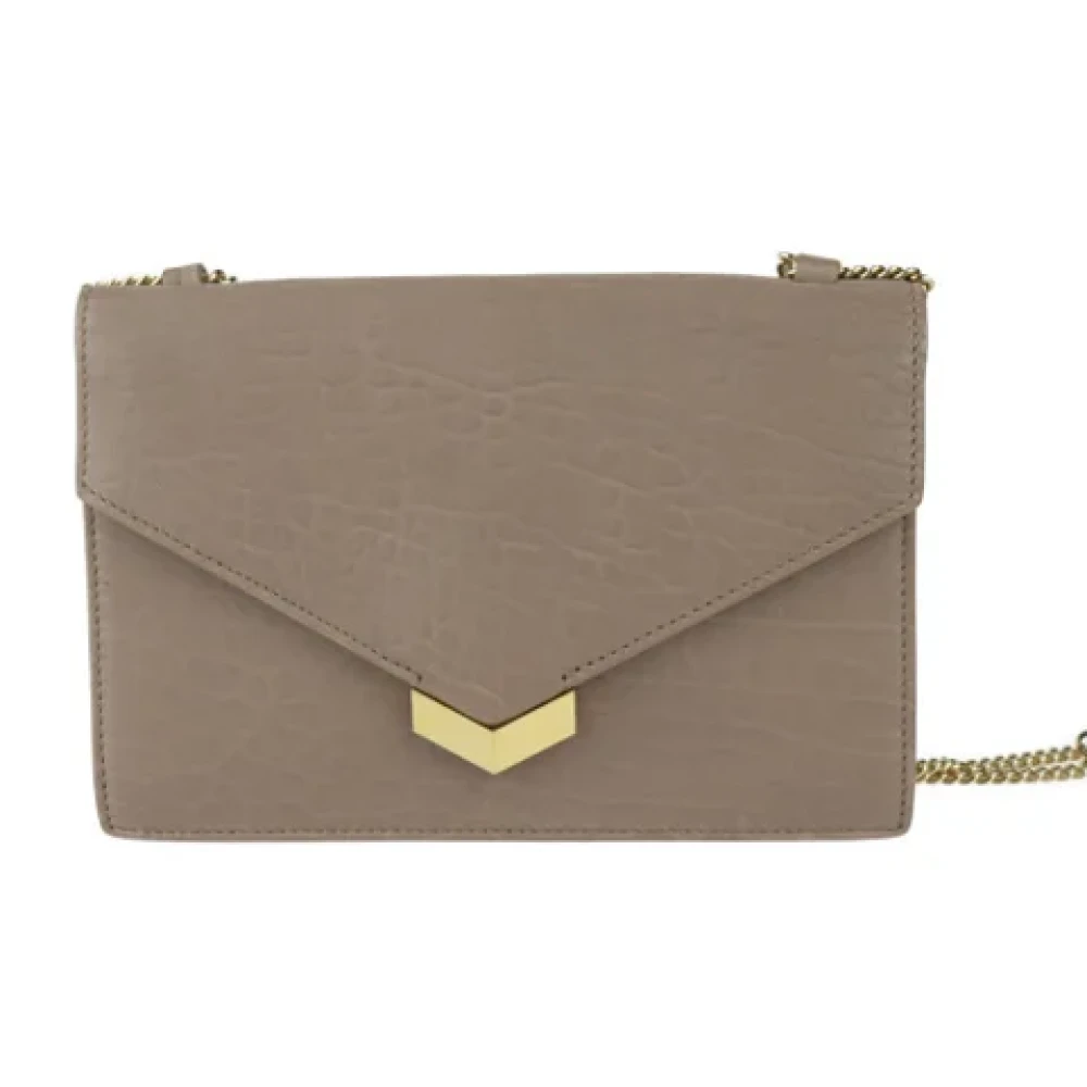 Jimmy Choo Pre-owned Leather clutches Beige Dames
