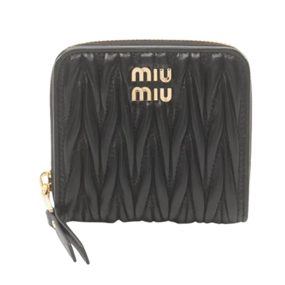 Miu Pre-owned Leather wallets Black Dames