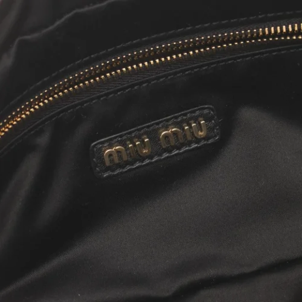 Miu Pre-owned Leather clutches Black Dames