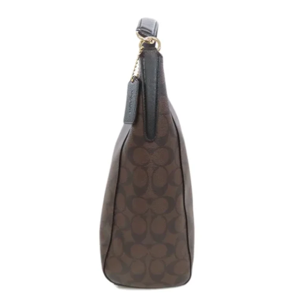 Coach Pre-owned Plastic handbags Brown Dames
