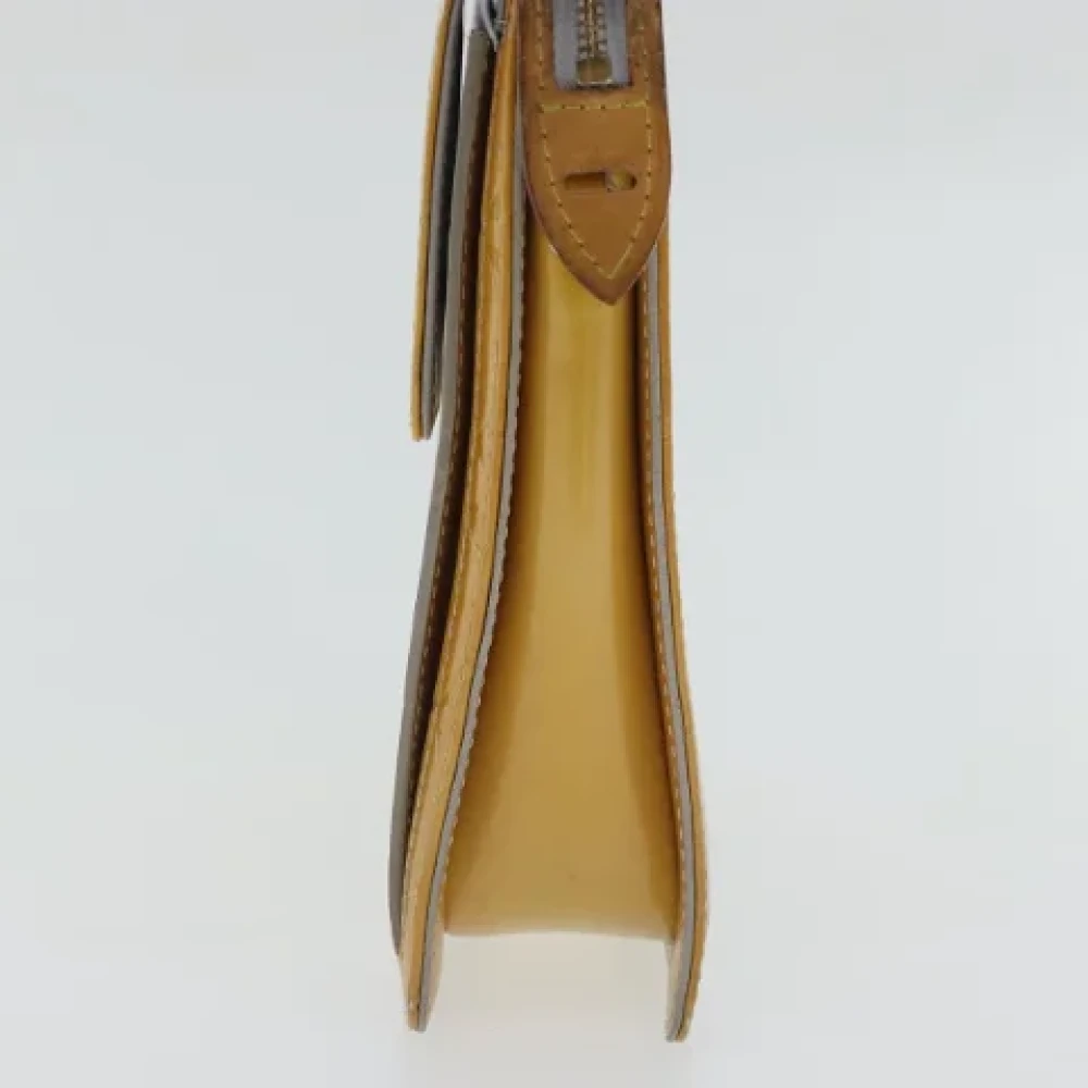 Louis Vuitton Vintage Pre-owned Leather pouches Yellow Dames