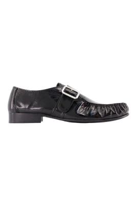Loafers i läder med fransar