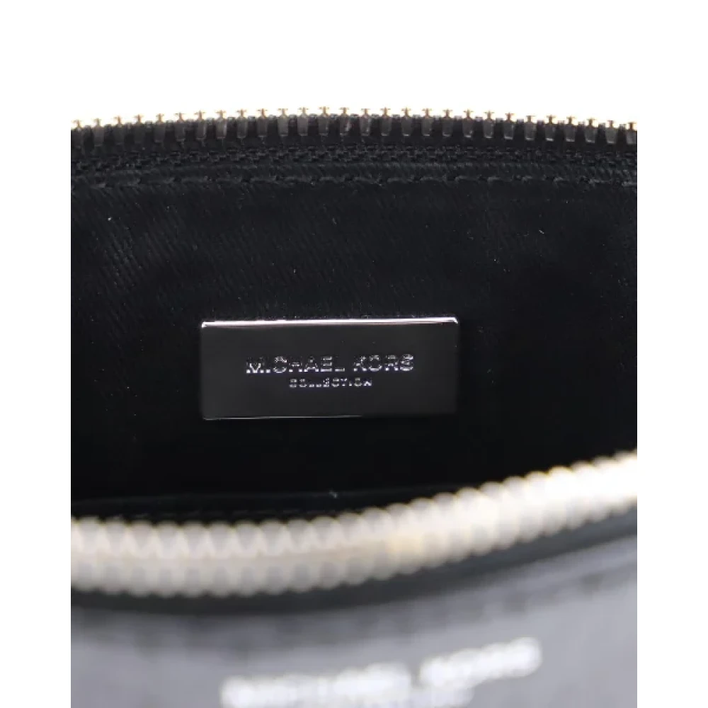 Michael Kors Pre-owned Leather pouches Black Dames