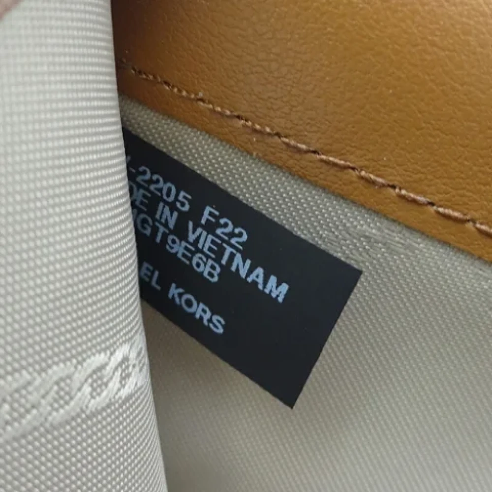 Michael Kors Pre-owned Canvas wallets Brown Dames